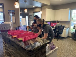 Hunsaker Team working at receptionist area , Salem and Monmouth Oregon